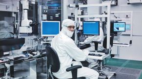 Employees in the fabrication facility (fab) manage the tools in the cleanroom. Each tool performs one step in creating a chip on a wafer.